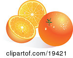 Waxy Whole Ripe Orange Fruit With Waterdrops Resting In Front Of A Halved Orange